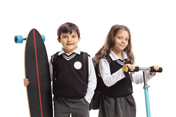 Bir Longboard Ile Schoolboy Beyaz Arka Planda Izole Bir Scooter — Stok fotoğraf