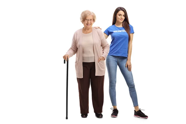 Ritratto Completo Una Donna Anziana Con Bastone Una Giovane Volontaria — Foto Stock