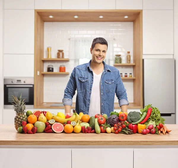Young Handsome Man Variety Fruits Vegetables Wooden Counter Kitchen — Stock Photo, Image