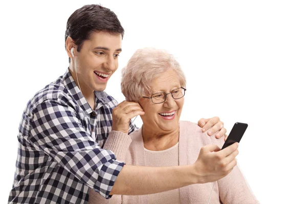 Young Man Senior Woman Listening Music Smartphone Isolated White Background — Stock Photo, Image