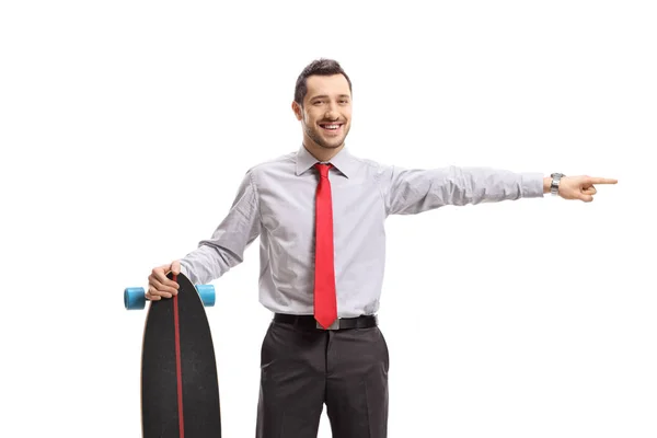 Young Businessman Longboard Pointing One Direction Isolated White Background — Stock Photo, Image