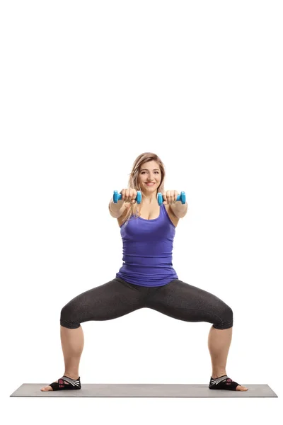 Full Length Portrait Young Woman Exercising Dumbbells Mat Isolated White — Stock Photo, Image