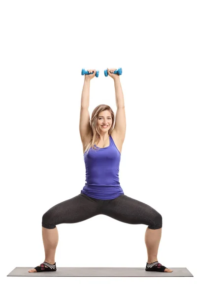 Full Length Portrait Young Woman Lifting Dumbbells Isolated White Background — Stock Photo, Image