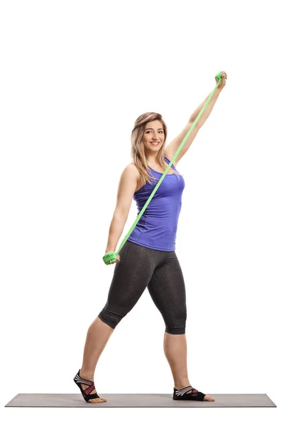 Full Length Shot Healthy Young Female Exercising Stretching Band Isolated — Stock Photo, Image