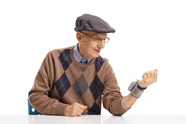 Elderly Man Measuring Blood Pressure Wrist Device Isolated White Background — Stock Photo, Image