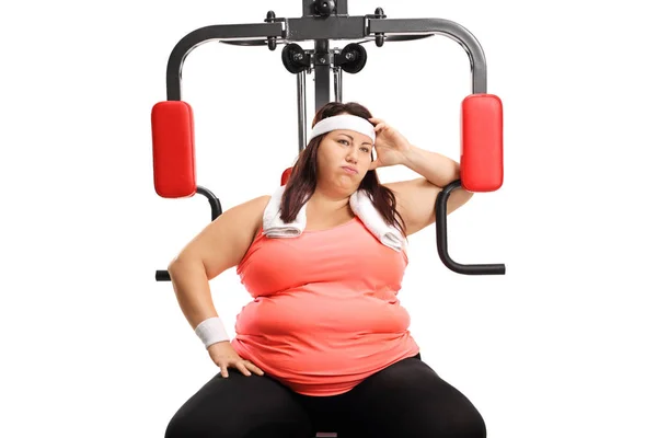 Corpulent Young Woman Fitness Machine Tired Exercising Isolated White Background — Stock Photo, Image