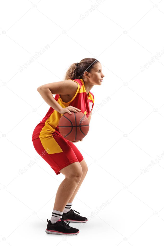 Female basketball player passing a ball
