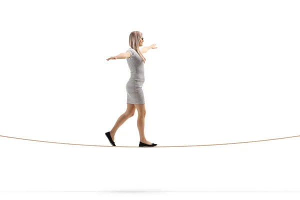 Full Length Profile Shot Young Blond Woman Walking Rope Arms — Stock Photo, Image