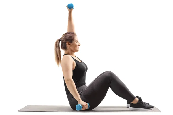 Young Woman Sitting Exercising Dumbbells Mat Isolated White Background — Stock Photo, Image