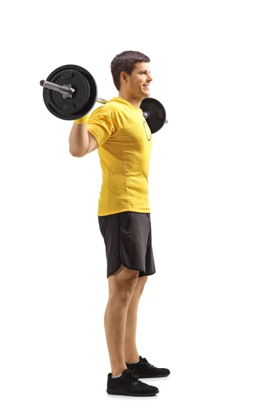 Full Length Shot Young Man Standing Lifting Weights Shoulders Isolated Stock Picture