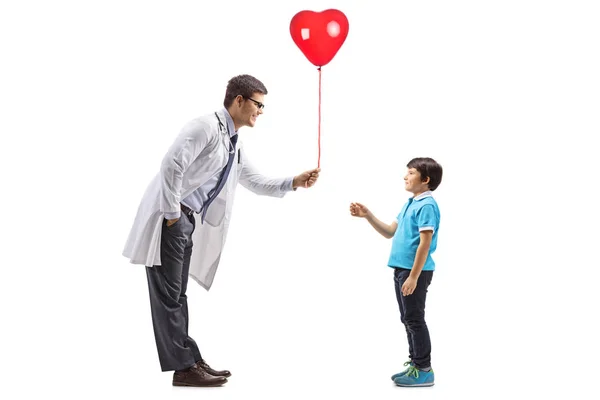 Full Length Profile Shot Male Doctor Giving Red Heart Balloon — Stock Photo, Image