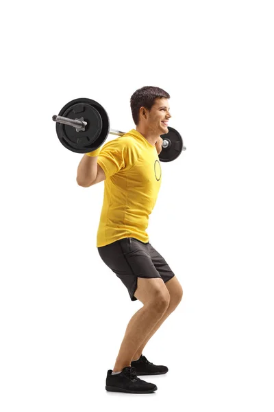 Full Length Shot Young Man Lifting Weights Kneeling Isolated White — Stock Photo, Image