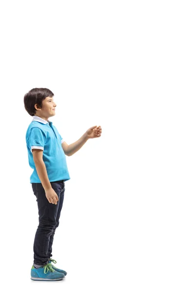 Pełna Długość Strzał Profil Dziecka Czekając Wskazując Ręki Izolowane Białym — Zdjęcie stockowe