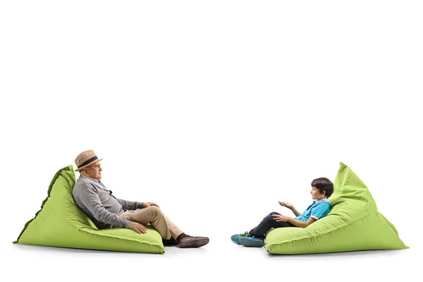 Full Length Profile Shot Grandfather Grandson Sitting Bean Bags Isolated — Stock Photo, Image