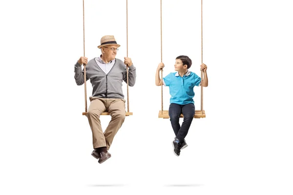 Full Length Portrait Senior Man Boy Sitting Swings Looking Each — Stock Photo, Image