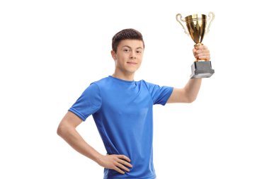 Genç spor adam oyuncu altın bir kupa tutan