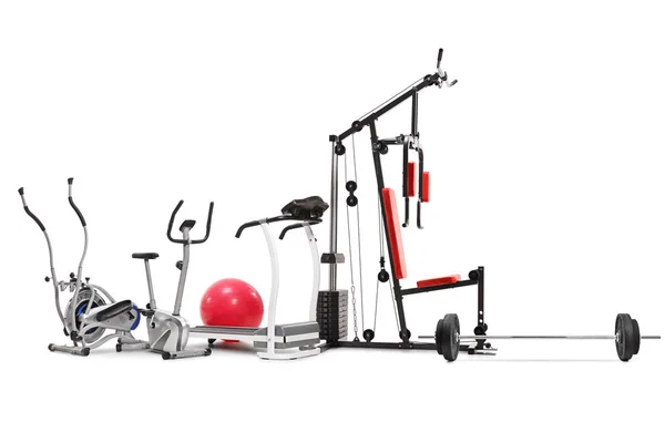 Diferentes equipamentos e máquinas de exercício — Fotografia de Stock