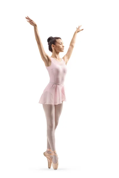 Jonge vrouwelijke balletdanseres met armen opgetild — Stockfoto