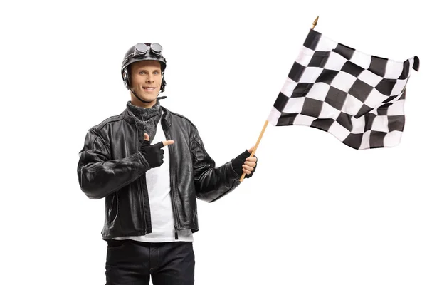 Young Male Biker Waving Checkered Race Flag Pointing Isolated White — 스톡 사진