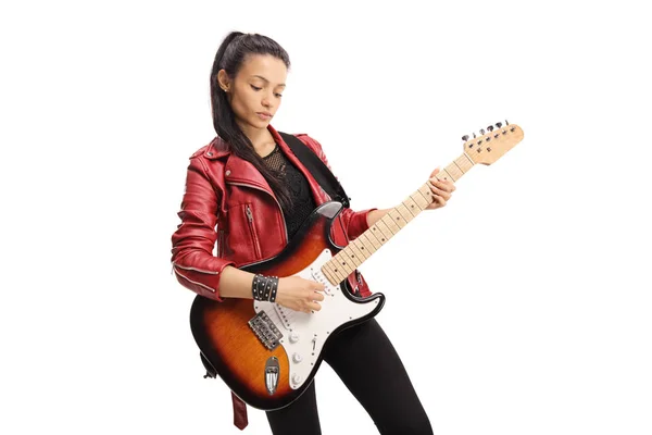 Female rock star playing a bass guitar isolated on white background