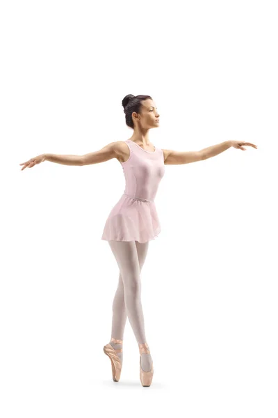 Полнометражный Снимок Молодой Танцовщицы Танцующей Цыпочках Белом Фоне — стоковое фото