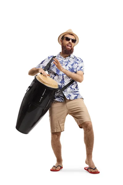 Bearded young man playing conga drums — Stock Photo, Image