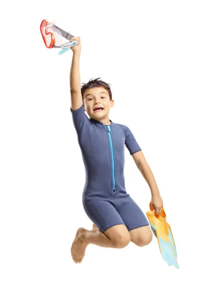Full Length Portrait Happy Boy Wetsuit Holding Swmming Fins Jumping — Stock Photo, Image