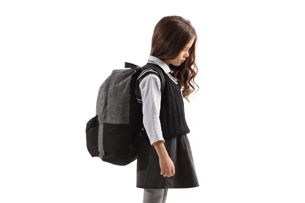 Smutně Malá školačka s batohem — Stock fotografie