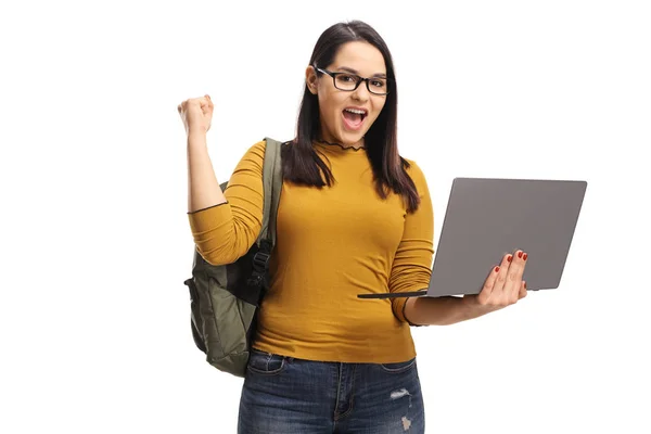 Happy female student with a laptop gesturing with hand — Stock Photo, Image