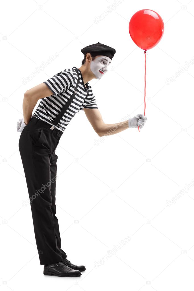 Mime giving a red balloon