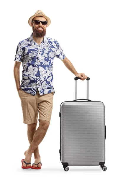 Bearded man tourist posing with a suitcase — Stock Photo, Image