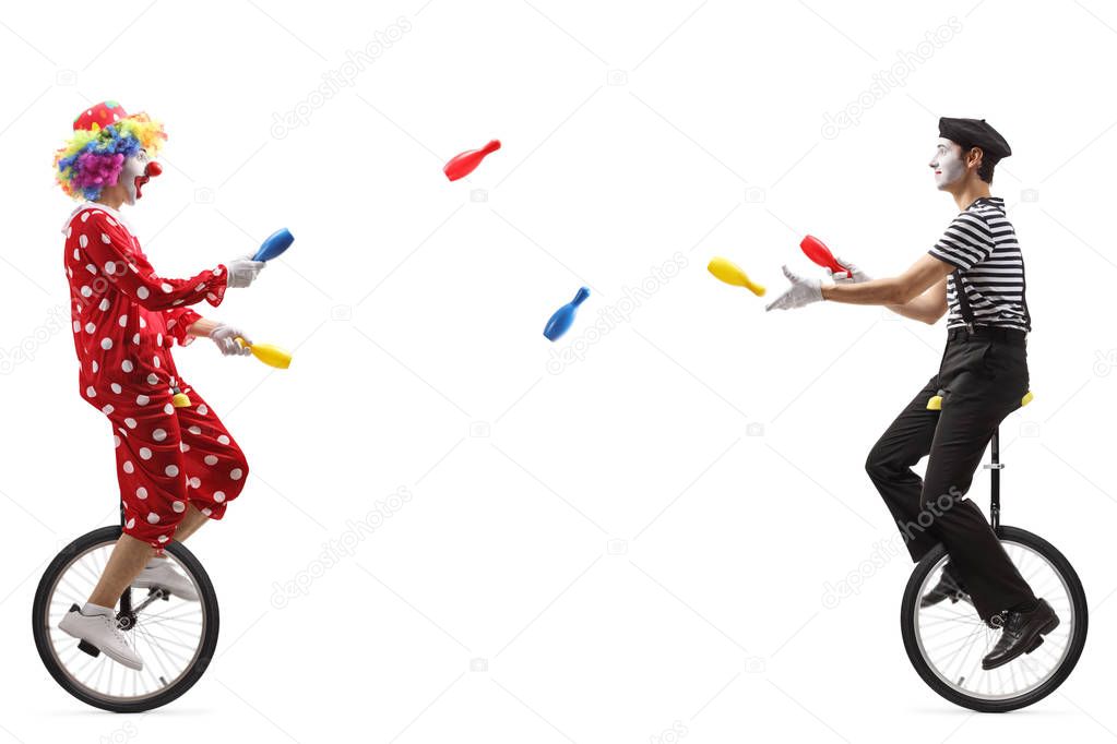 Mime and clown on unicycles juggling with clubs