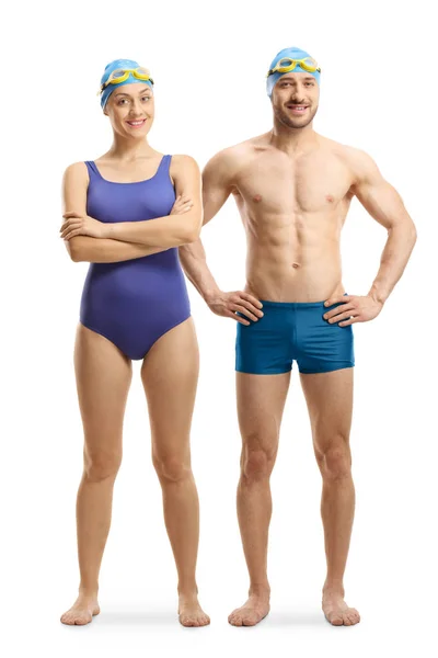 Jeune homme et femme en maillot de bain, googles et casquette — Photo