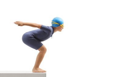 Dalış kıyafeti giymiş çocuk yüzmeye uçmaya hazırlanıyor