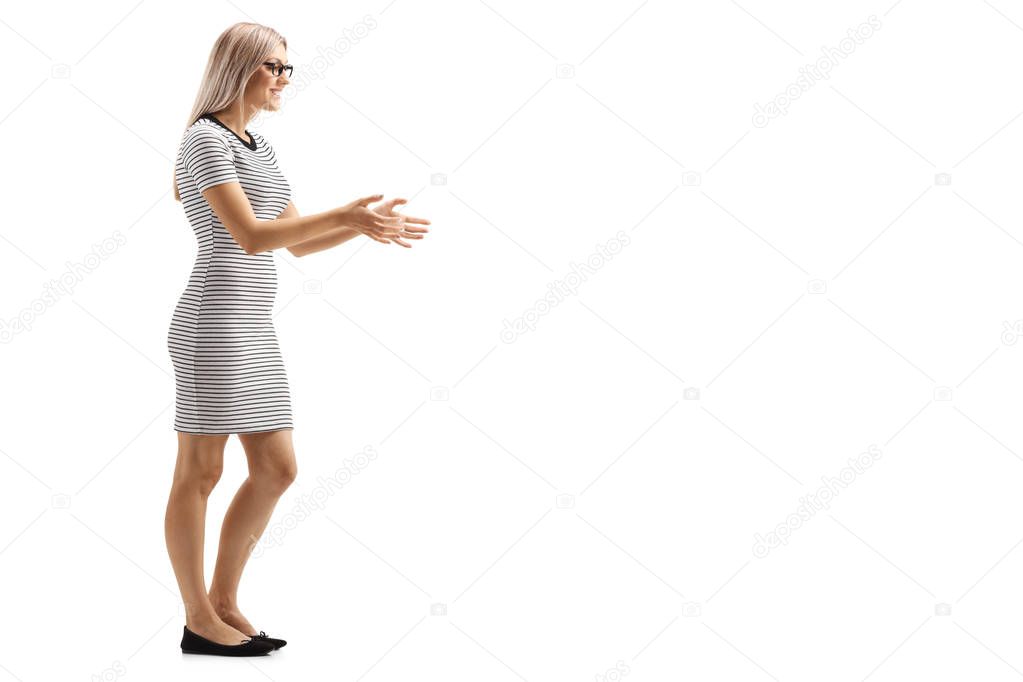 Young blond woman waiting to receive something