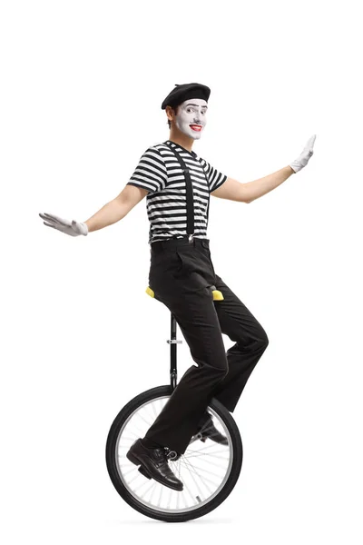 MIME rijden op een eenwieler en het maken van een grimas — Stockfoto