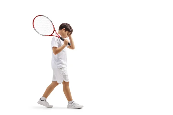 Triest jongen met een tennis racket — Stockfoto