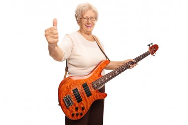 Başparmak gösteren bir elektrik gitar ile Mutlu yaşlı kadın