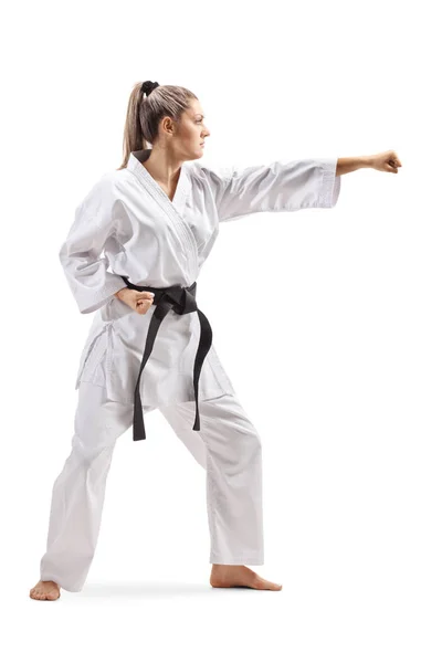 Mujer joven en kimono practicando artes marciales —  Fotos de Stock