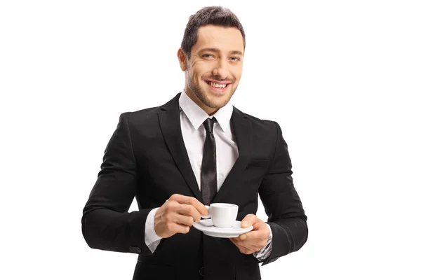 Junger Profi in Anzug und Krawatte mit einer Tasse Espresso — Stockfoto