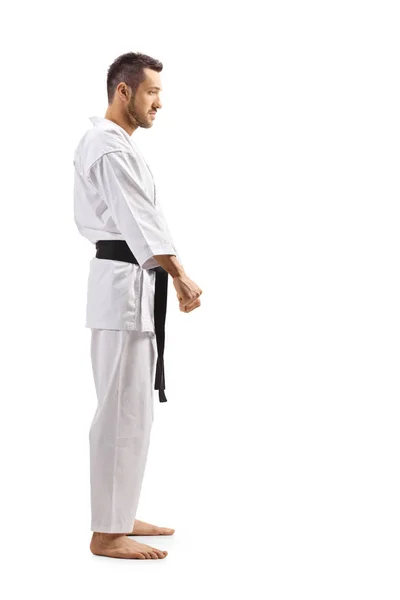 Muž v karate kimono s černým pásem — Stock fotografie