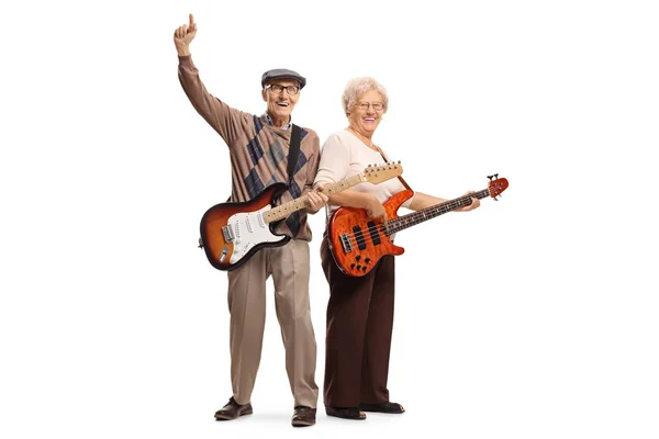 Cool elderly man and woman with electric guitars — Stock Photo, Image