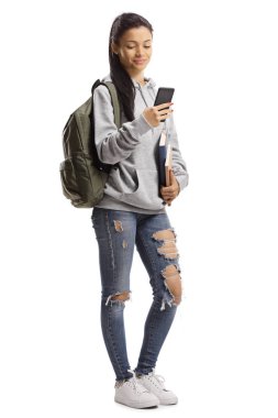 Kitap ve cep telefonu ile Trendy genç kız öğrenci 