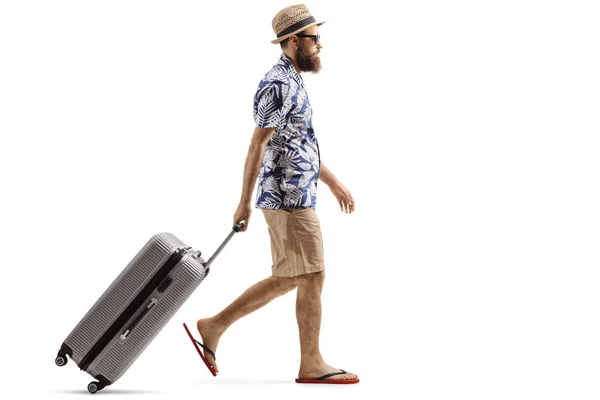 Bearded man with a suitcase walking — Stock Photo, Image