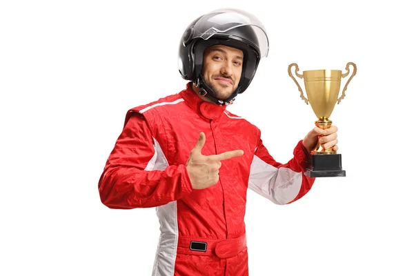 Campeão de corrida usando um capacete e segurando uma taça de troféu de ouro — Fotografia de Stock