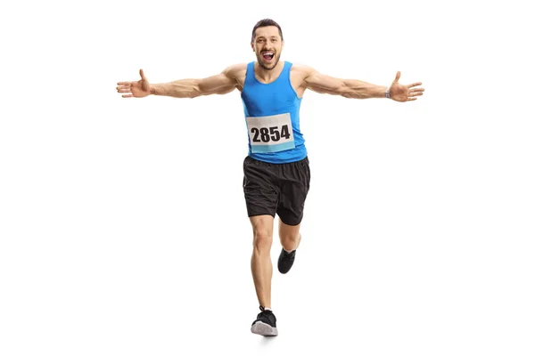 Young male runner running a marathon — Stock Photo, Image