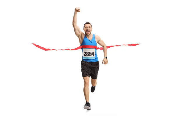 Człowiek kończąc maraton i wskazując szczęścia z ręki — Zdjęcie stockowe