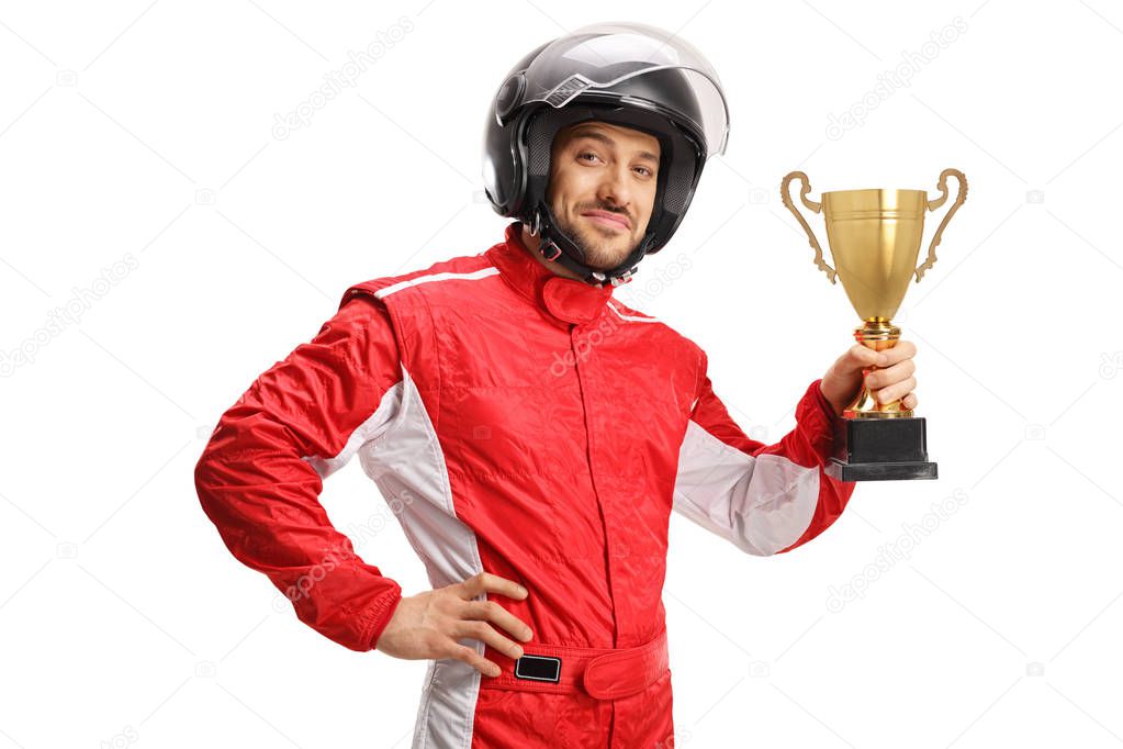 Racer with a helmet holding a gold trophy cup