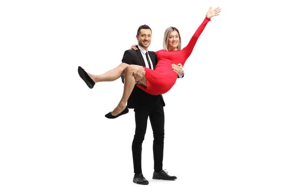 Jonge man in een pak met een vrouw zwaaiende — Stockfoto