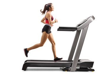 Koşu bandında koşan genç sportif bayan atlet